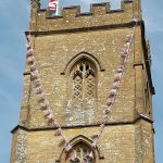 St Andrews chruch spire decorated with union jack bunting